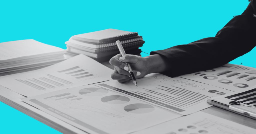 Person writing on forms